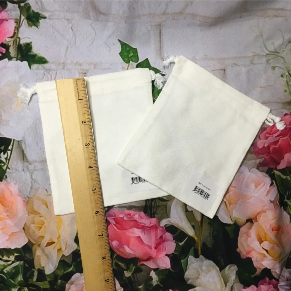TWO (2) Guerlain mini small white drawstring dustbag new approx 5” x 5”